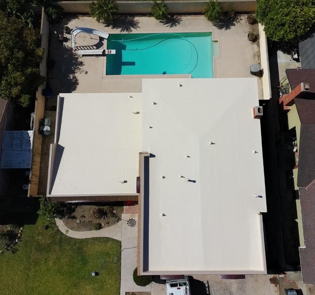 Aerial view of a gray tile roof installation