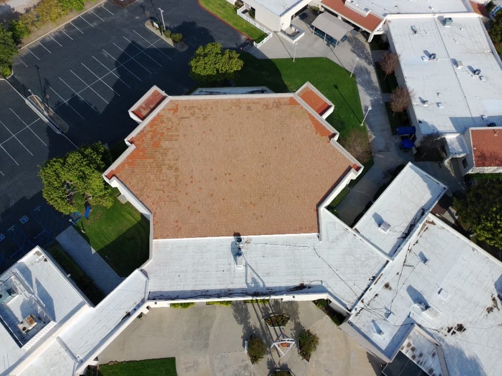 Aerial drone photo of a completed residential roofing project