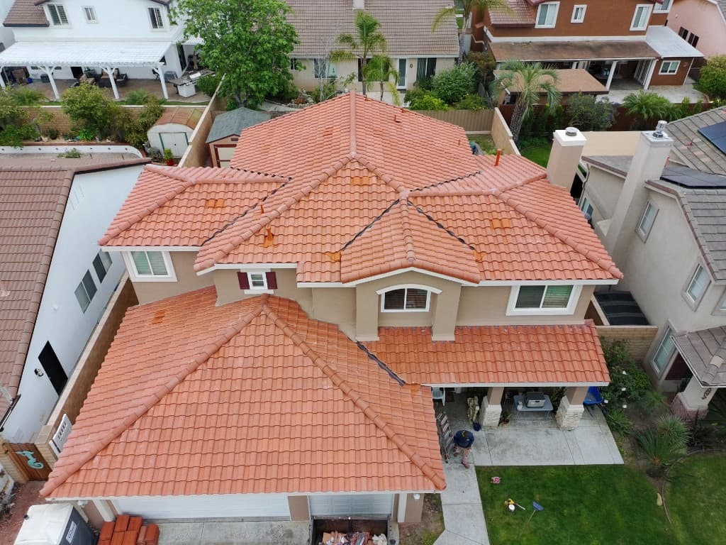 Aerial view of the same Oxnard home after tile roof replacement with Barcelona 900 terracotta profile tiles