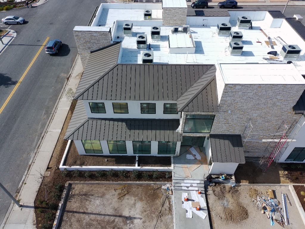 Warehouse with newly installed corrugated metal roofing